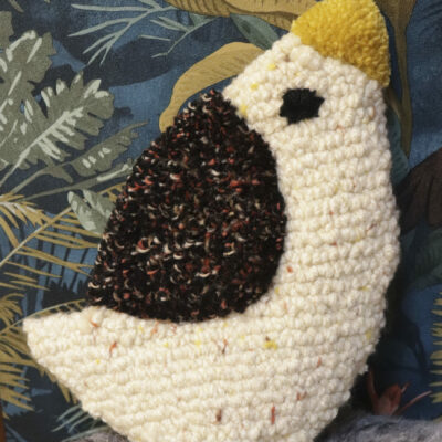 Bird (white with specks and brown speckled wing)